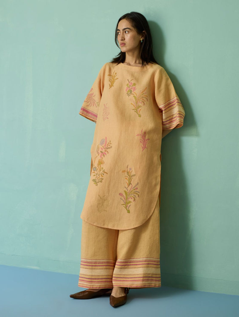 Nami Floral Block-Printed Curved Hem Kurta Set - Apricot linen light kurta set by Manan in apricot for women Worldwide