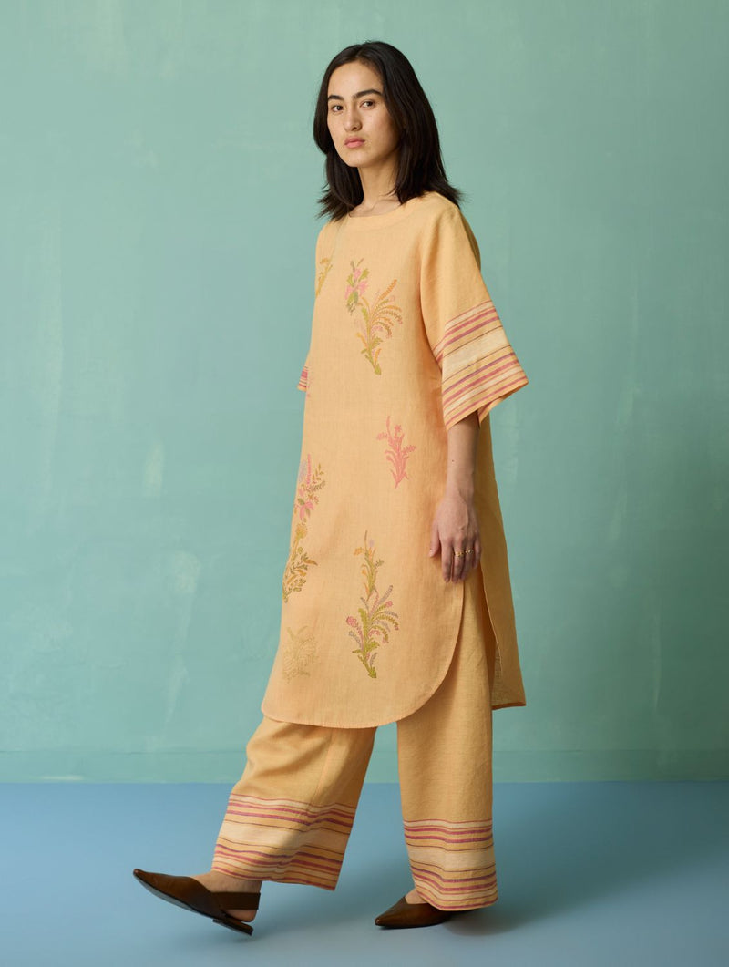Nami Floral Block-Printed Curved Hem Kurta Set - Apricot linen light kurta set by Manan in apricot for women Worldwide