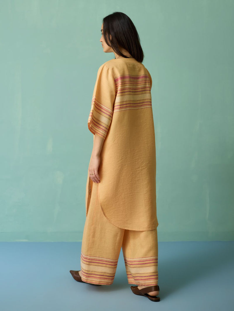Nami Floral Block-Printed Curved Hem Kurta Set - Apricot linen light kurta set by Manan in apricot for women Worldwide