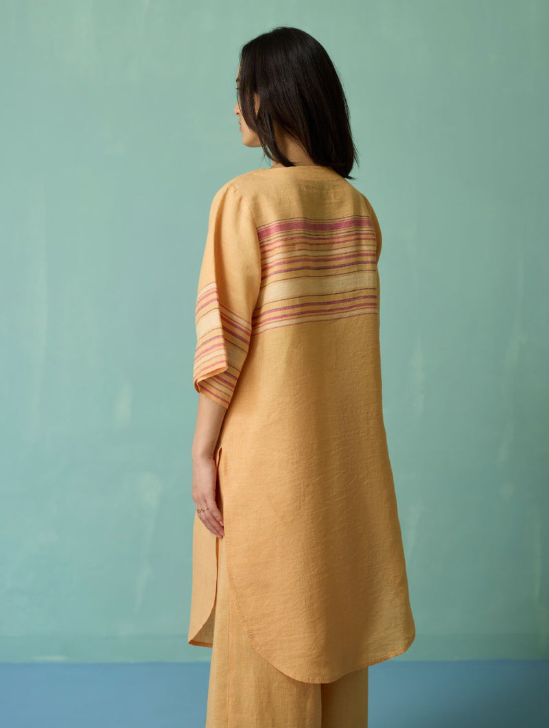 Nami Floral Block-Printed Curved Hem Kurta Set - Apricot linen light kurta set by Manan in apricot for women Worldwide