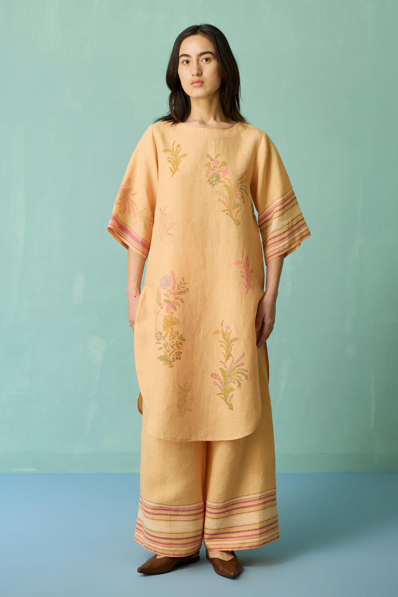 Nami Floral Block-Printed Curved Hem Kurta Set - Apricot linen light kurta set by Manan in apricot for women Worldwide