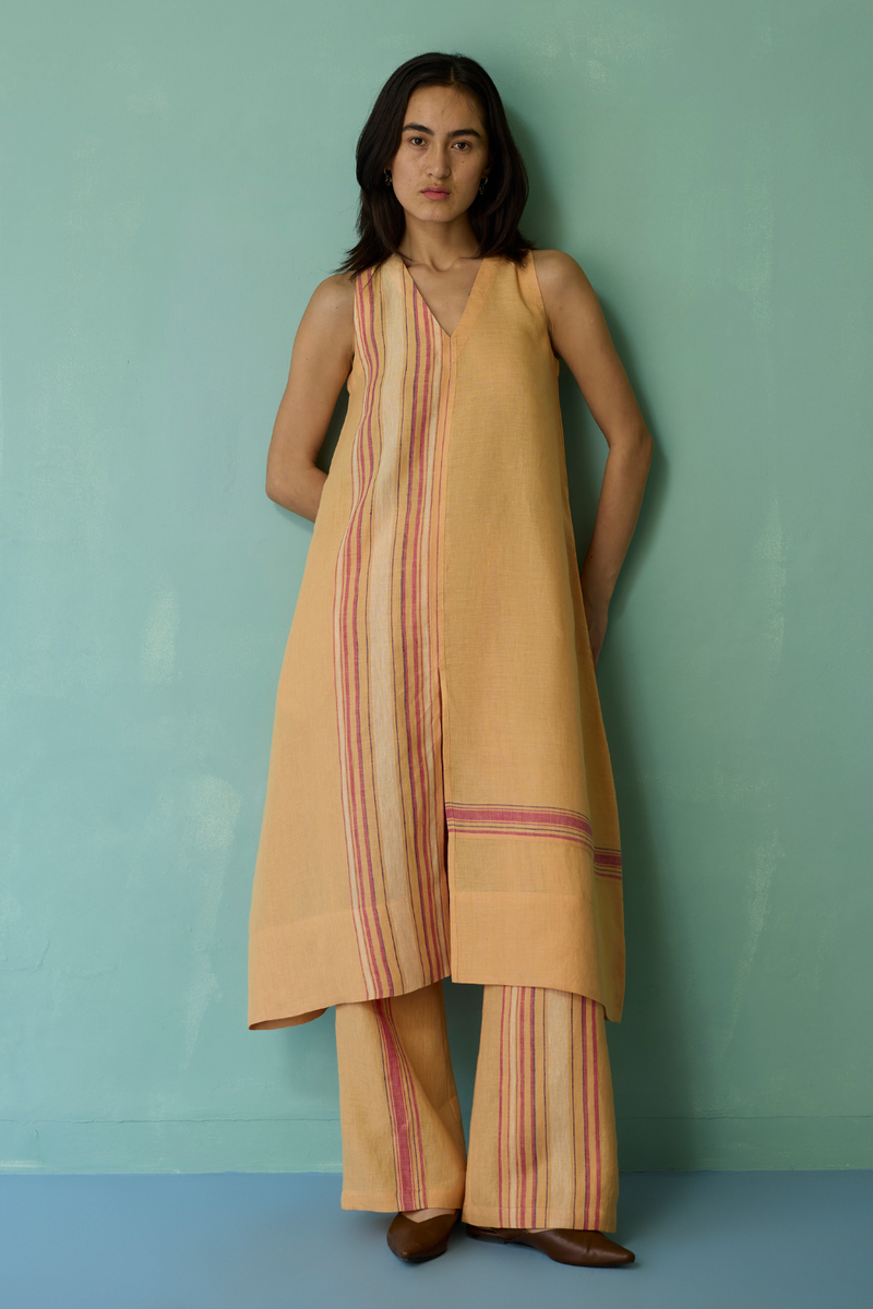 Vanya Border Linen Sleeveless Kurta Set - Apricot linen light kurta set by Manan in apricot for women Worldwide
