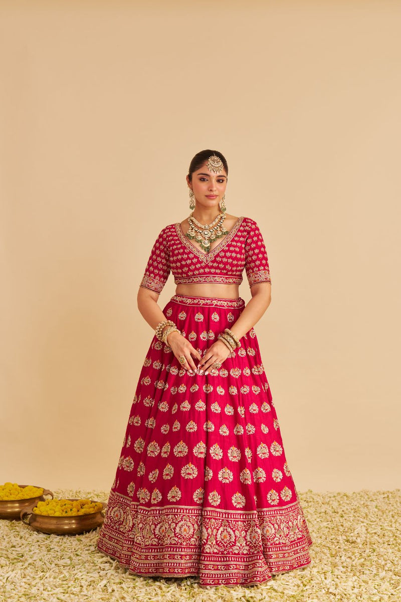 Maira - Dabka Zardozi Embroidered Raw Silk Hotpink Bridal Lehenga Set silk by SHEETAL BATRA in pink color for women Worldwide