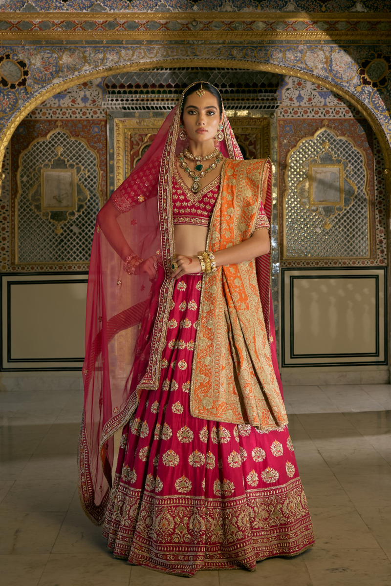 Maira - Dabka Zardozi Embroidered Raw Silk Hotpink Bridal Lehenga Set silk by SHEETAL BATRA in pink color for women Worldwide