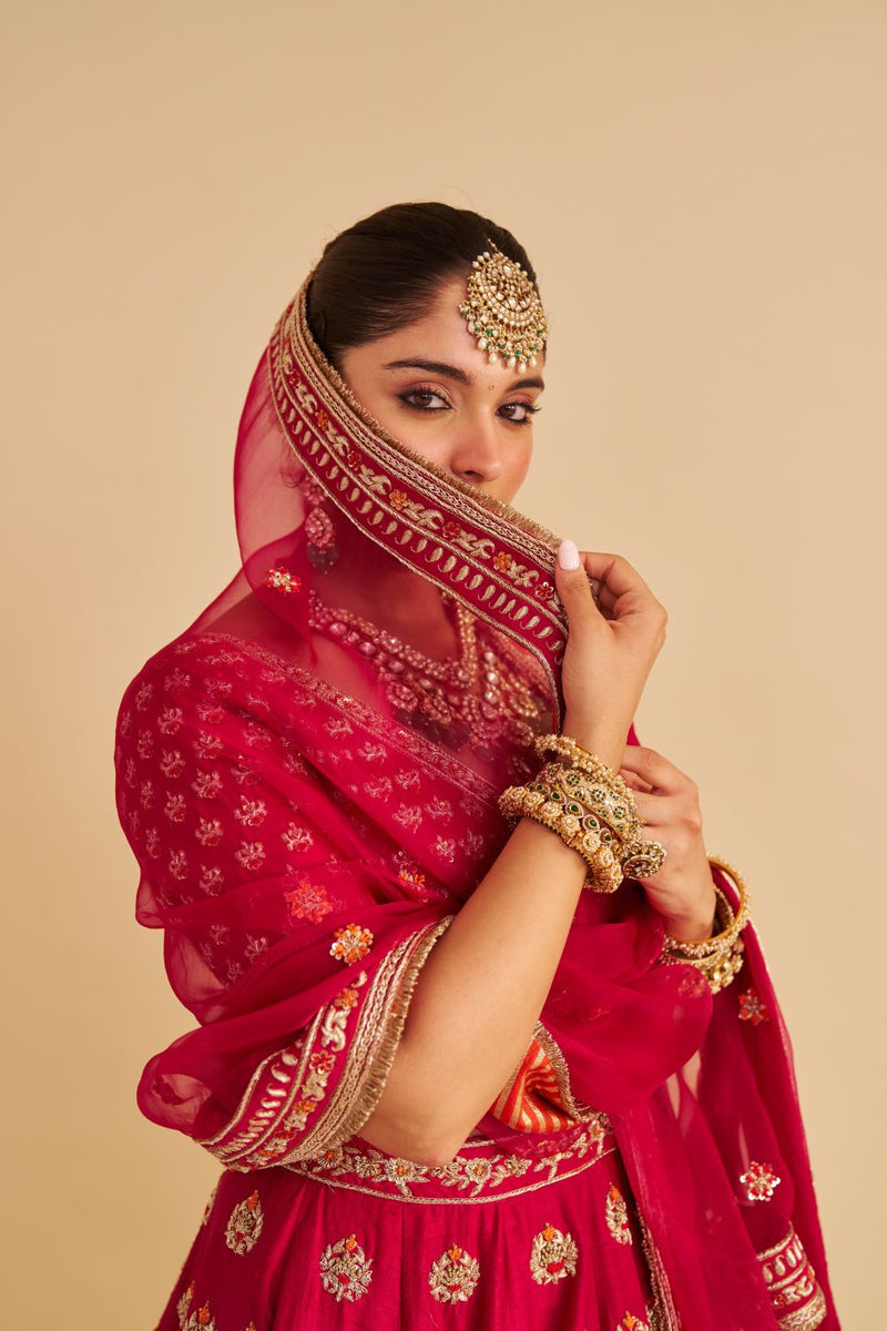 Maira - Dabka Zardozi Embroidered Raw Silk Hotpink Bridal Lehenga Set silk by SHEETAL BATRA in pink color for women Worldwide