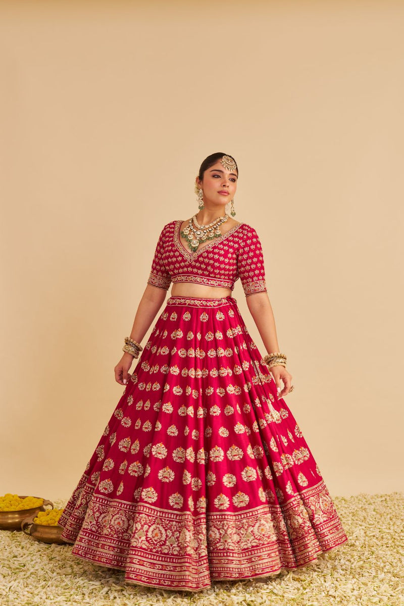 Maira - Dabka Zardozi Embroidered Raw Silk Hotpink Bridal Lehenga Set silk by SHEETAL BATRA in pink color for women Worldwide