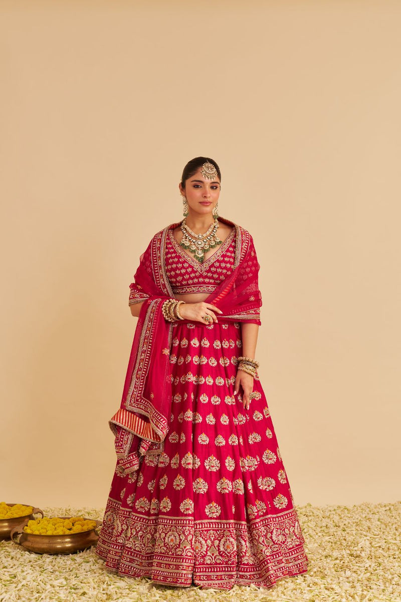 Maira - Dabka Zardozi Embroidered Raw Silk Hotpink Bridal Lehenga Set silk by SHEETAL BATRA in pink color for women Worldwide