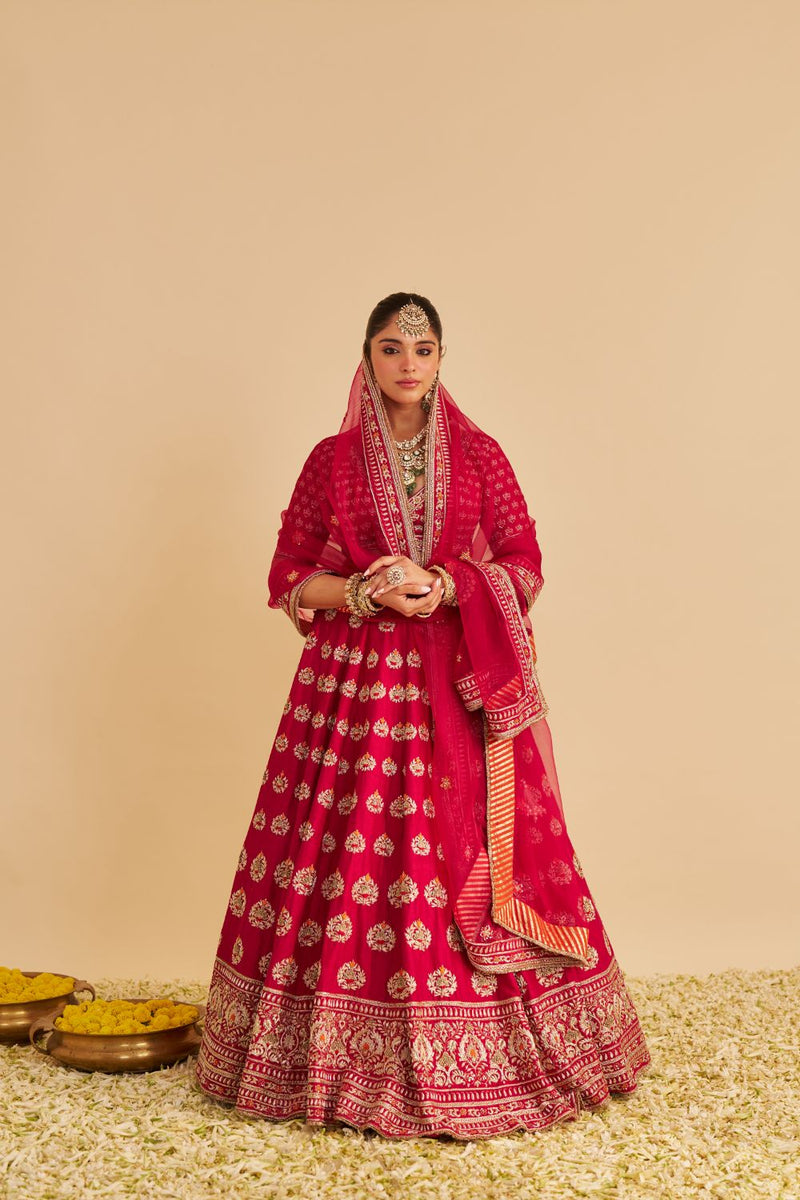 Maira - Dabka Zardozi Embroidered Raw Silk Hotpink Bridal Lehenga Set silk by SHEETAL BATRA in pink color for women Worldwide