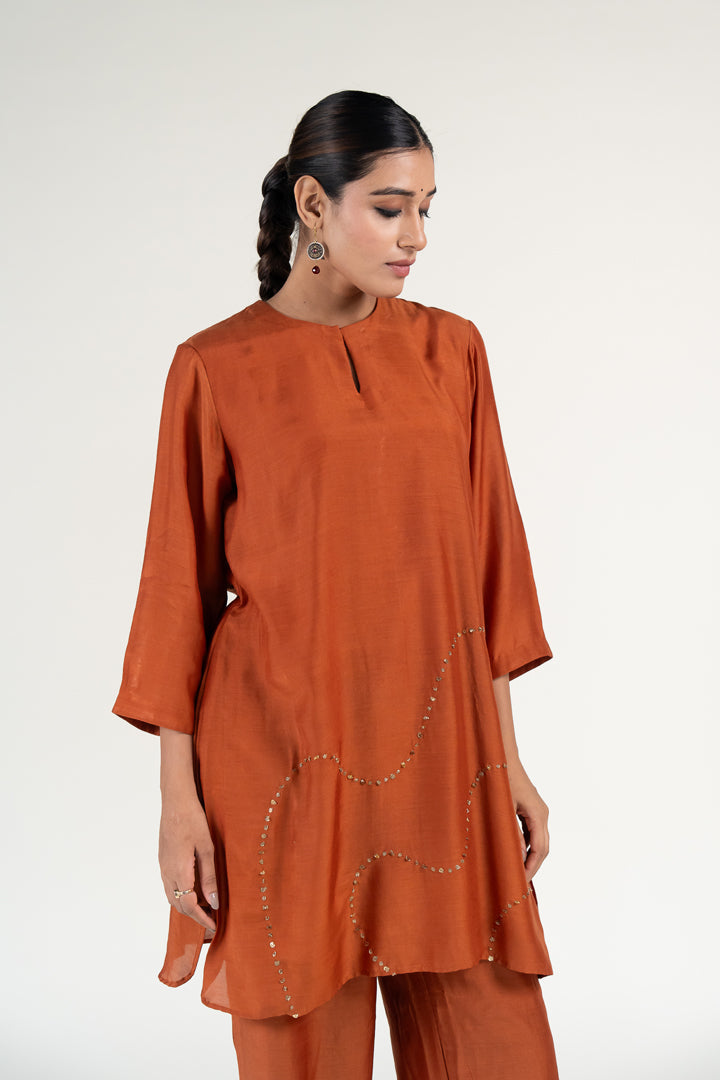 Mehr Kurta Set 
with Ayra Odhani-Rust silk by Nirjara in rust color for women Worldwide
