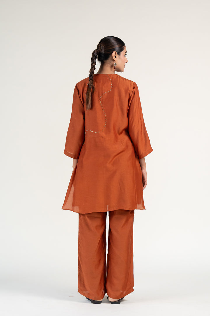 Mehr Kurta Set-Rust silk by Nirjara in rust color for women Worldwide
