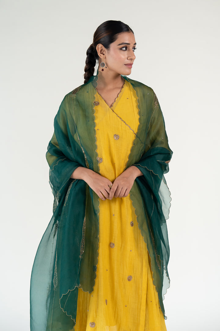 Yellow Angarkha Set
with Shama Odhani-Mustard & Emerald chanderi by Nirjara in yellow color for women Worldwide