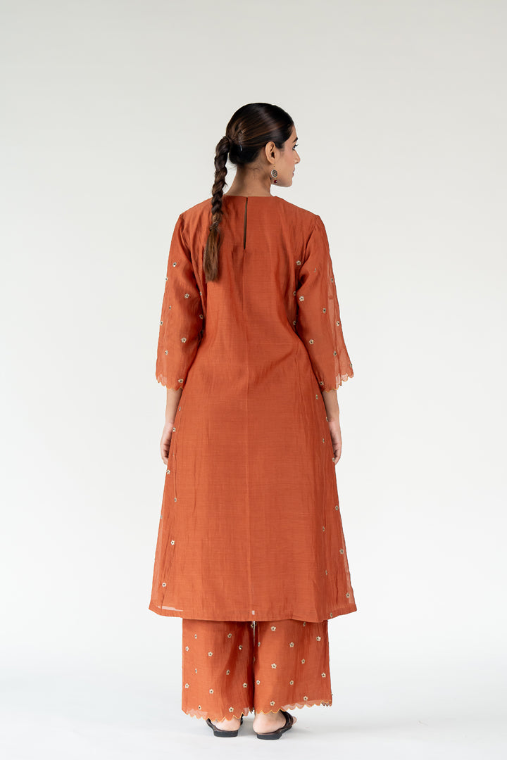 Fiza Kurta Set-Rust chanderi by Nirjara in rust color for women Worldwide