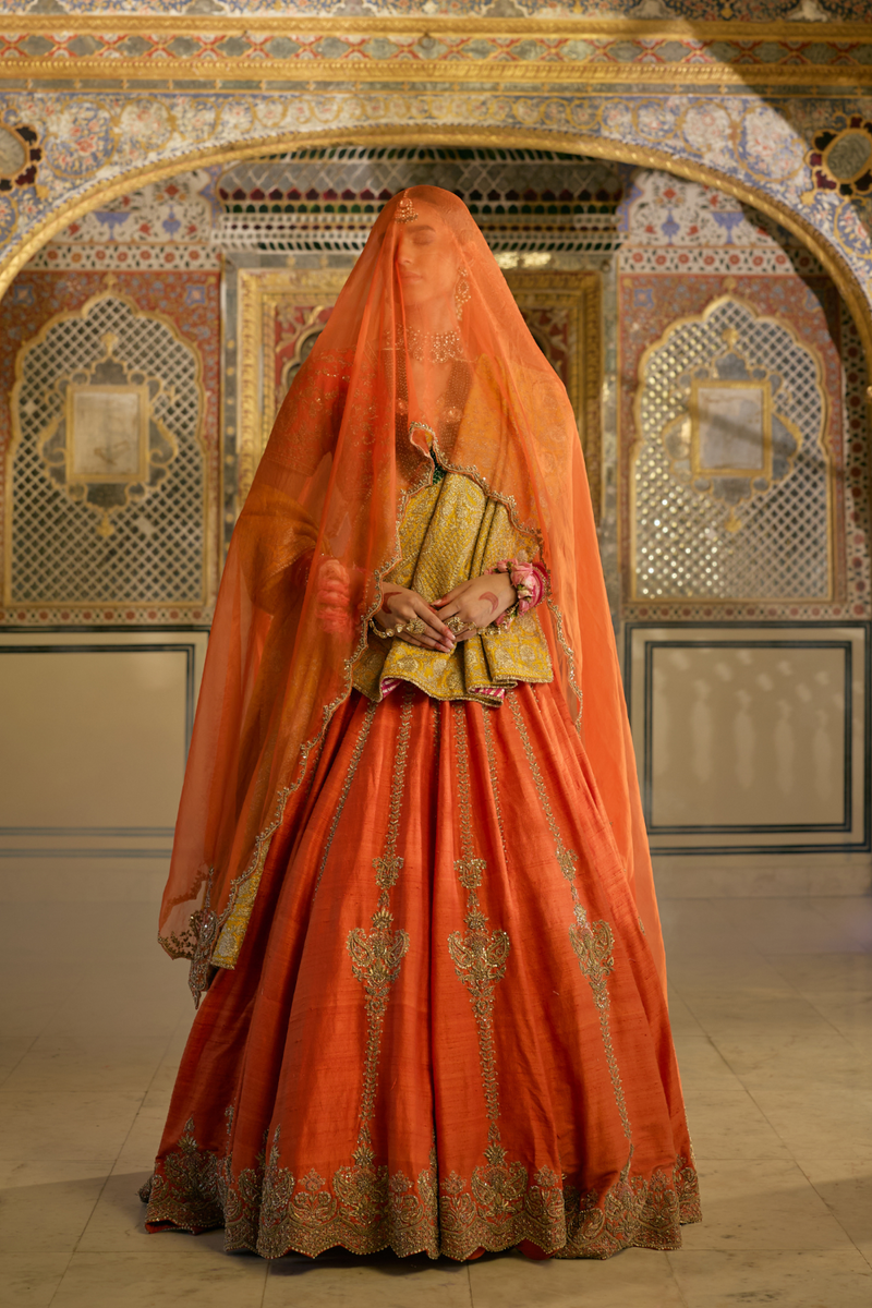 Naazila - Dabka Zardozi Embroidered Raw Silk Burnt Orange Lehenga Set silk by SHEETAL BATRA in orange color for women Worldwide
