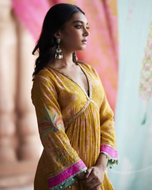Nadira Yellow Tree Bell Sleeve Kurta Set by Rajiramniq in yellow color for women Worldwide