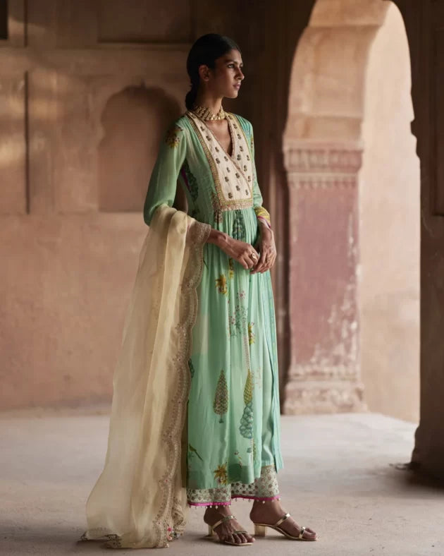 Nadira Powder Blue Pintuck Angrakha Kurta Set by Rajiramniq for women Worldwide