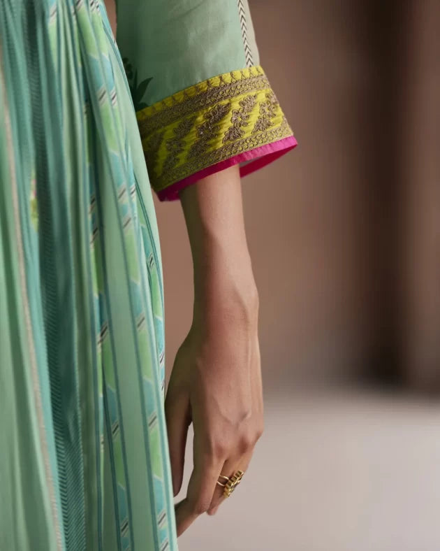 Nadira Powder Blue Pintuck Angrakha Kurta Set by Rajiramniq for women Worldwide