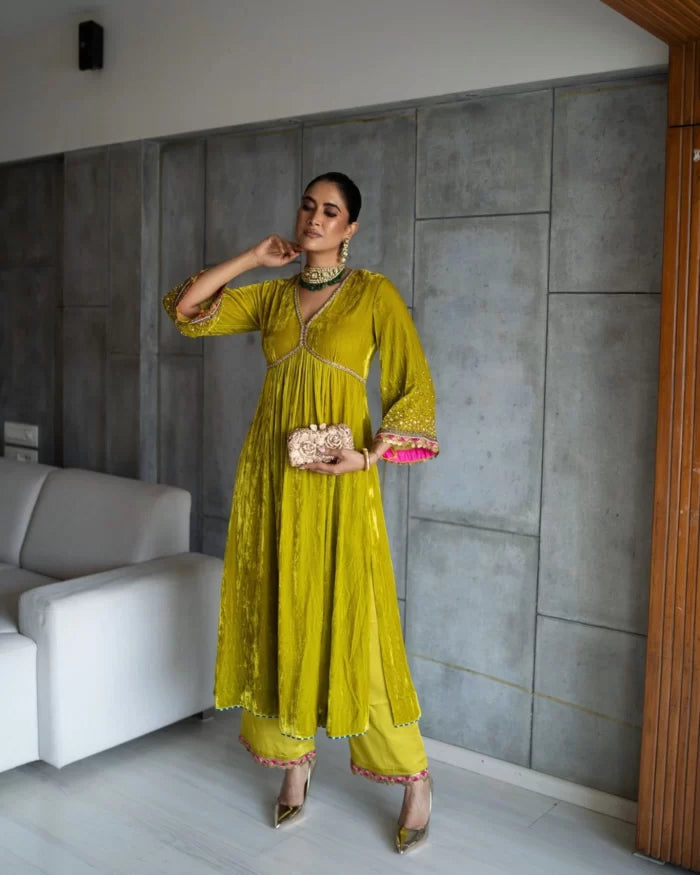 Nadira Lime Yellow Sprinkle Bell Sleeve Velvet Kurta Set by Rajiramniq for women Worldwide