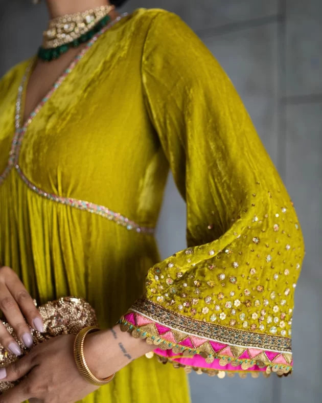 Nadira Lime Yellow Sprinkle Bell Sleeve Velvet Kurta Set by Rajiramniq for women Worldwide