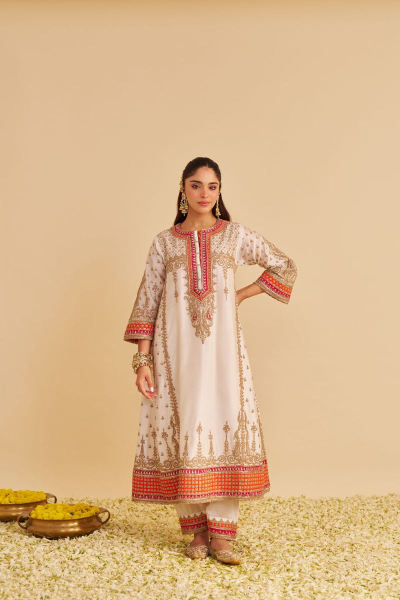 Nargis - Dabka Zardozi Embroidered Rich Banarasi Kalidaar Daisy Ivory Long Chauga Set satin by SHEETAL BATRA in ivory color for women Worldwide