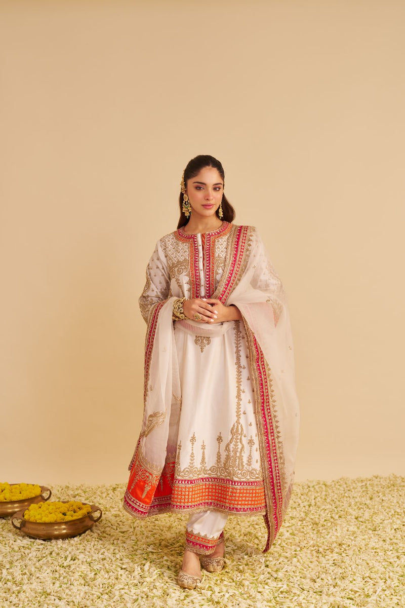 Nargis - Dabka Zardozi Embroidered Rich Banarasi Kalidaar Daisy Ivory Long Chauga Set satin by SHEETAL BATRA in ivory color for women Worldwide