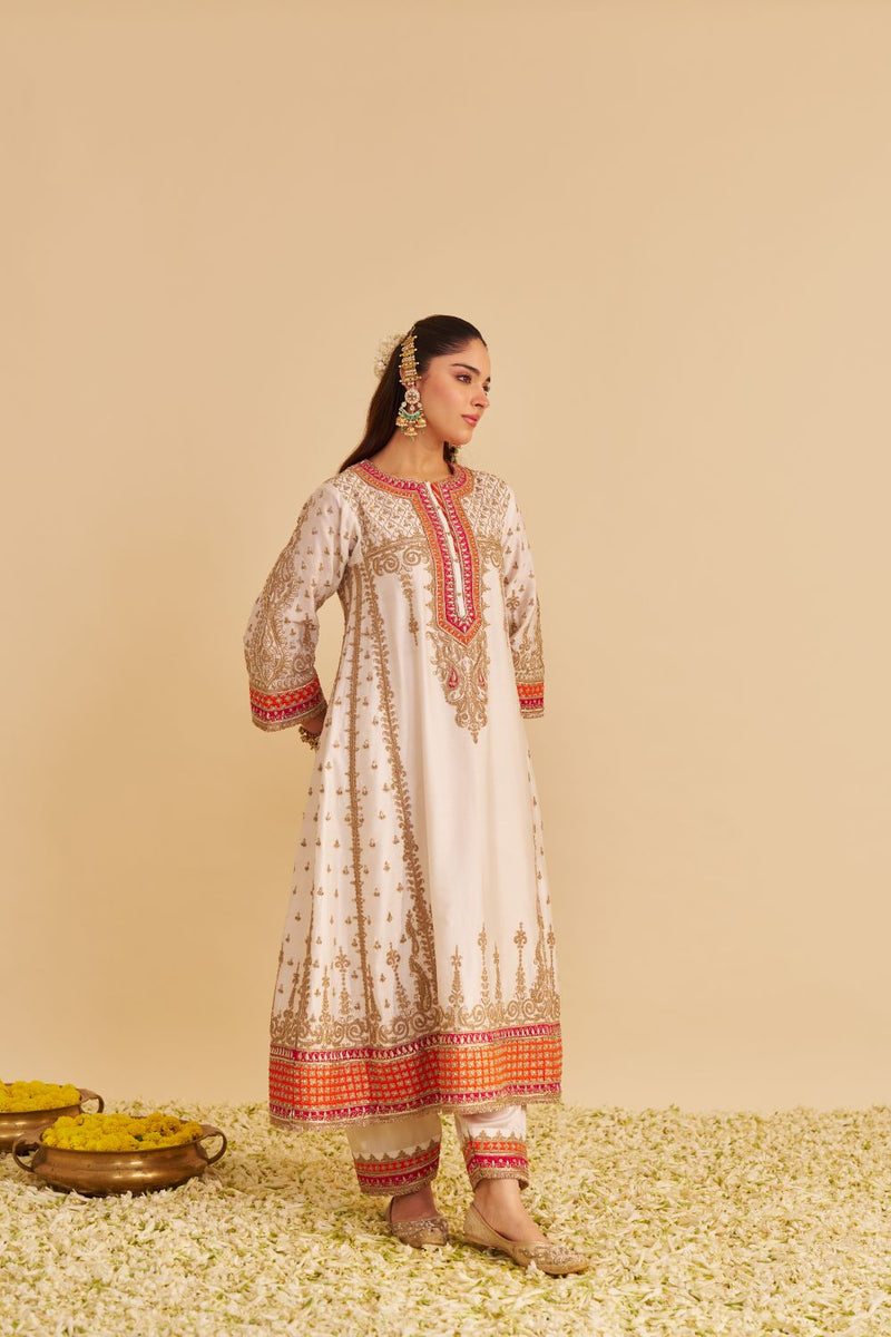 Nargis - Dabka Zardozi Embroidered Rich Banarasi Kalidaar Daisy Ivory Long Chauga Set satin by SHEETAL BATRA in ivory color for women Worldwide