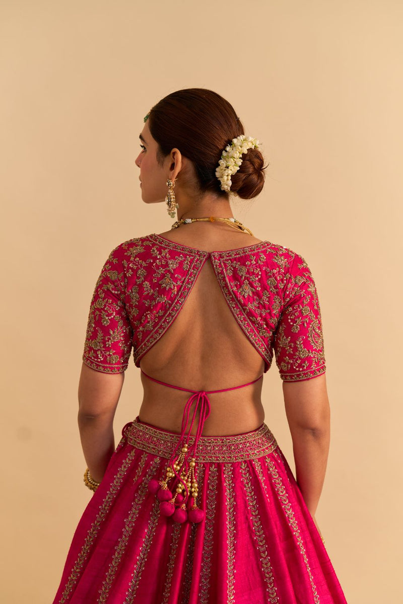 Naazila - Dabka Zardozi Embroidered Raw Silk Hotpink Lehenga Set by SHEETAL BATRA in pink color for women Worldwide