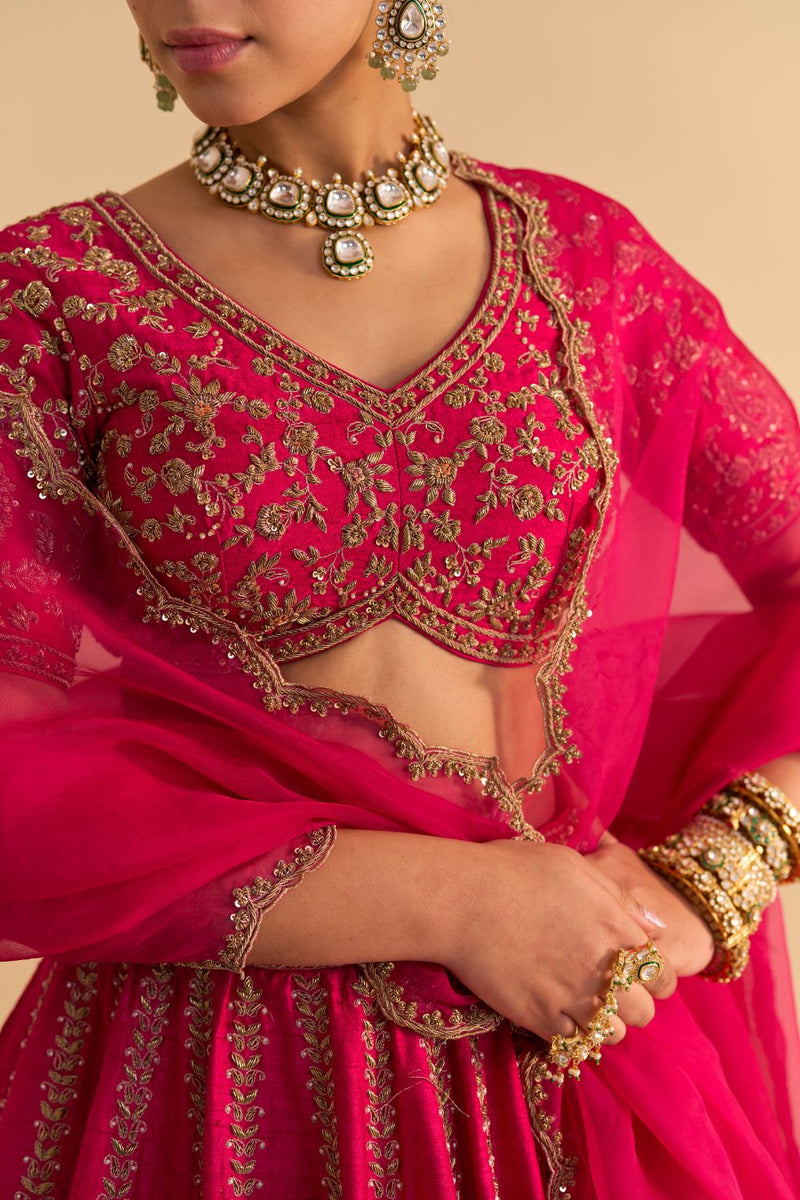 Naazila - Dabka Zardozi Embroidered Raw Silk Hotpink Lehenga Set by SHEETAL BATRA in pink color for women Worldwide
