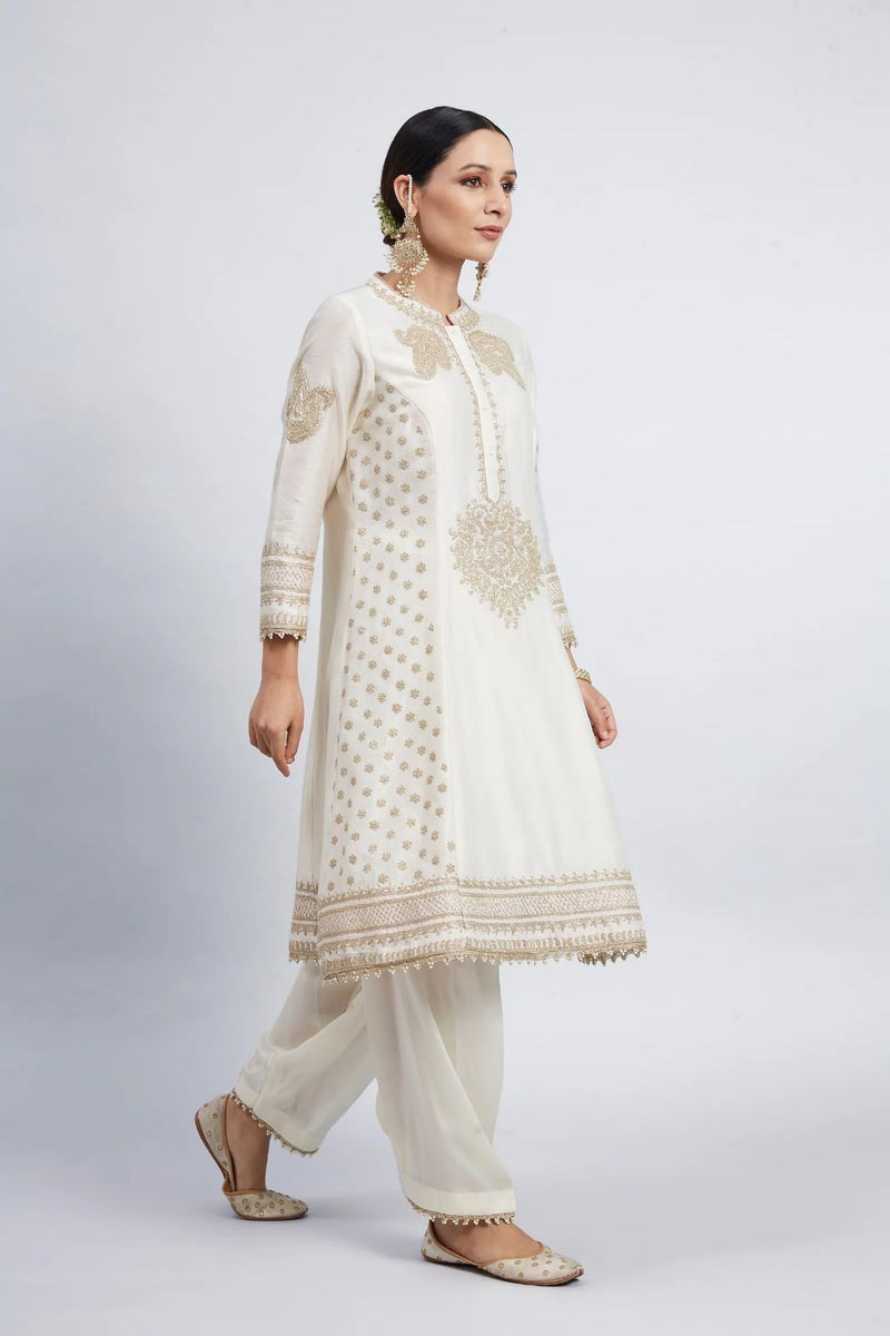 Naazira A-line short kurta with salwar and dupatta-Daisy Ivory silk by SHEETAL BATRA in ivory color for women Worldwide