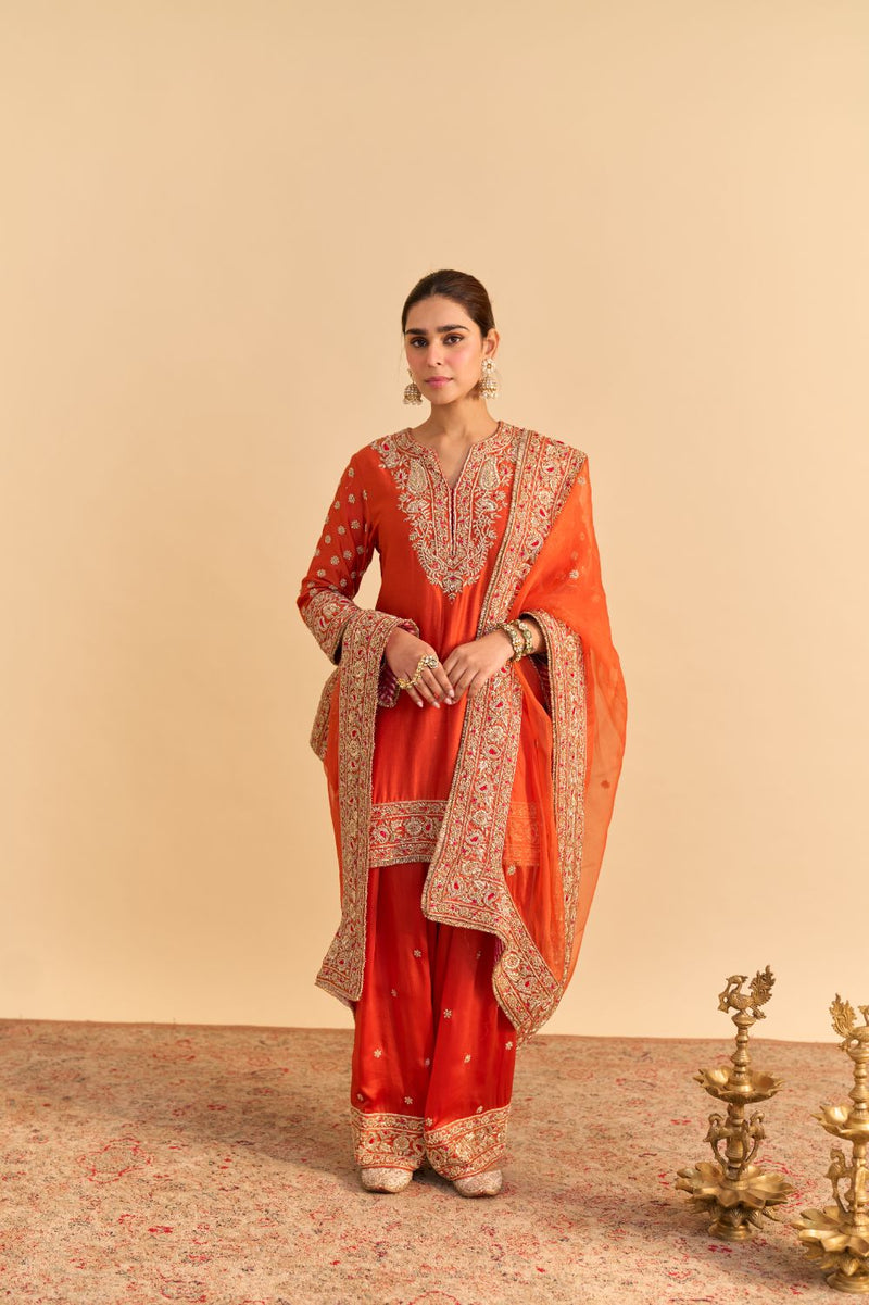 Naseha Burnt orange Dabka Zardozi Embroidered Short kurta Set by SHEETAL BATRA in orange color for women Worldwide