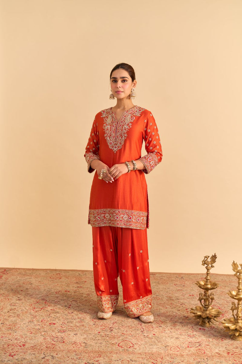 Naseha Burnt orange Dabka Zardozi Embroidered Short kurta Set by SHEETAL BATRA in orange color for women Worldwide