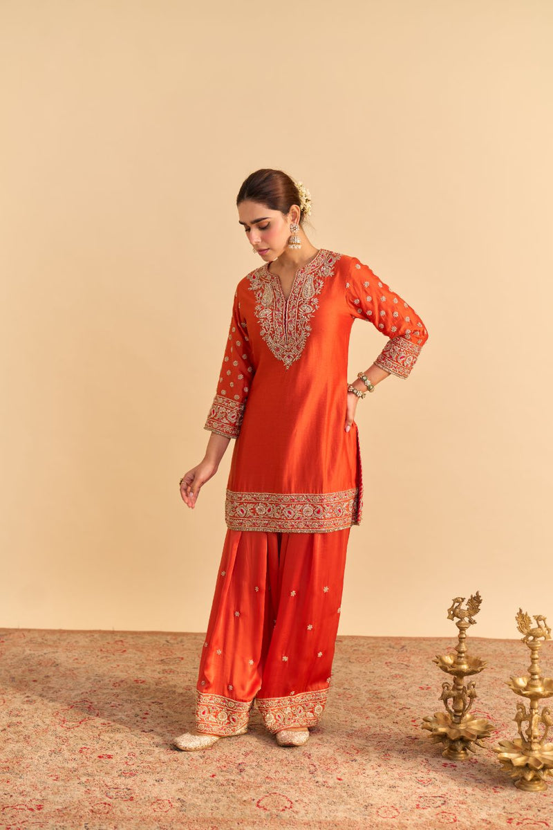 Naseha Burnt orange Dabka Zardozi Embroidered Short kurta Set by SHEETAL BATRA in orange color for women Worldwide