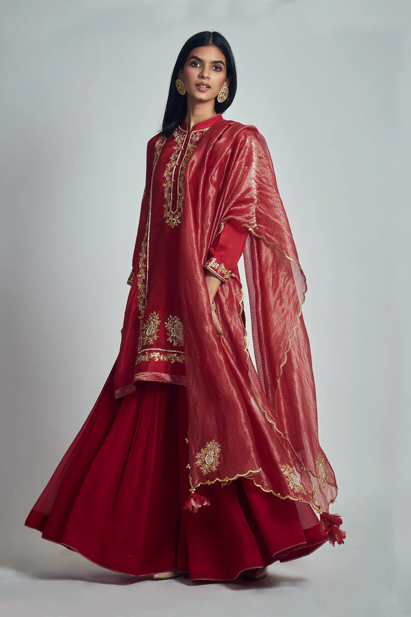 Nasira Short Kurta with Salwar and Dupatta-Deep red silk by SHEETAL BATRA in red color for women Worldwide