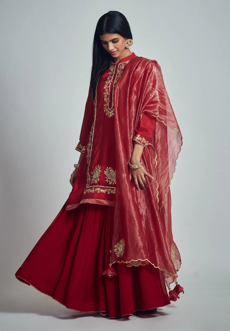 Nasira Short Kurta with Salwar and Dupatta-Deep red silk by SHEETAL BATRA in red color for women Worldwide