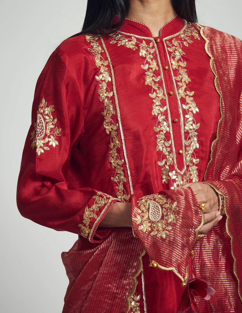 Nasira Short Kurta with Salwar and Dupatta-Deep red silk by SHEETAL BATRA in red color for women Worldwide
