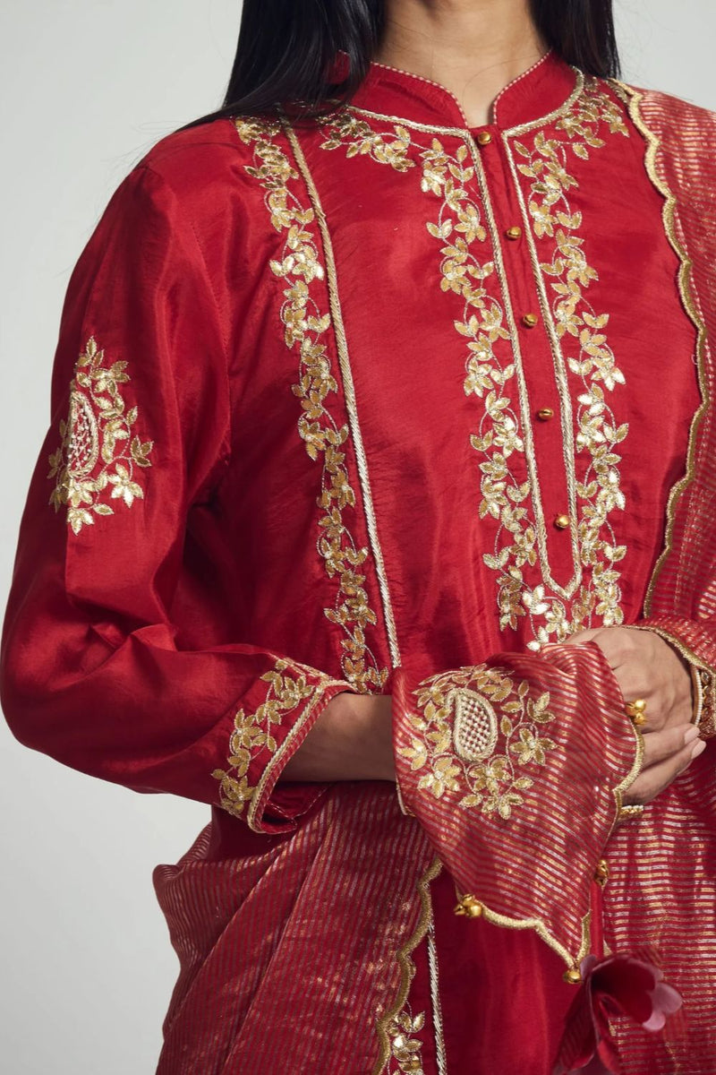 Nazish Short Kurta with Salwar and Dupatta-Deep red silk by SHEETAL BATRA in red color for women Worldwide