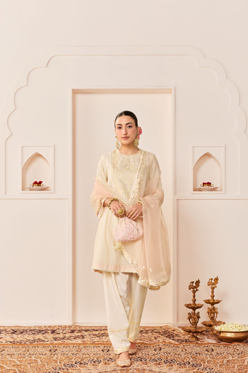 NIDA - DAISY IVORY SHORT CHOGA WITH FARSHI SALWAR chanderi silk kurta/kurta set by SHEETAL BATRA in daisy ivory with carnation pink for women Worldwide