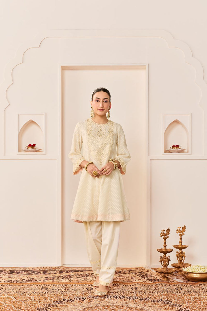 NIDA - DAISY IVORY SHORT CHOGA WITH FARSHI SALWAR chanderi silk kurta/kurta set by SHEETAL BATRA in daisy ivory with carnation pink for women Worldwide