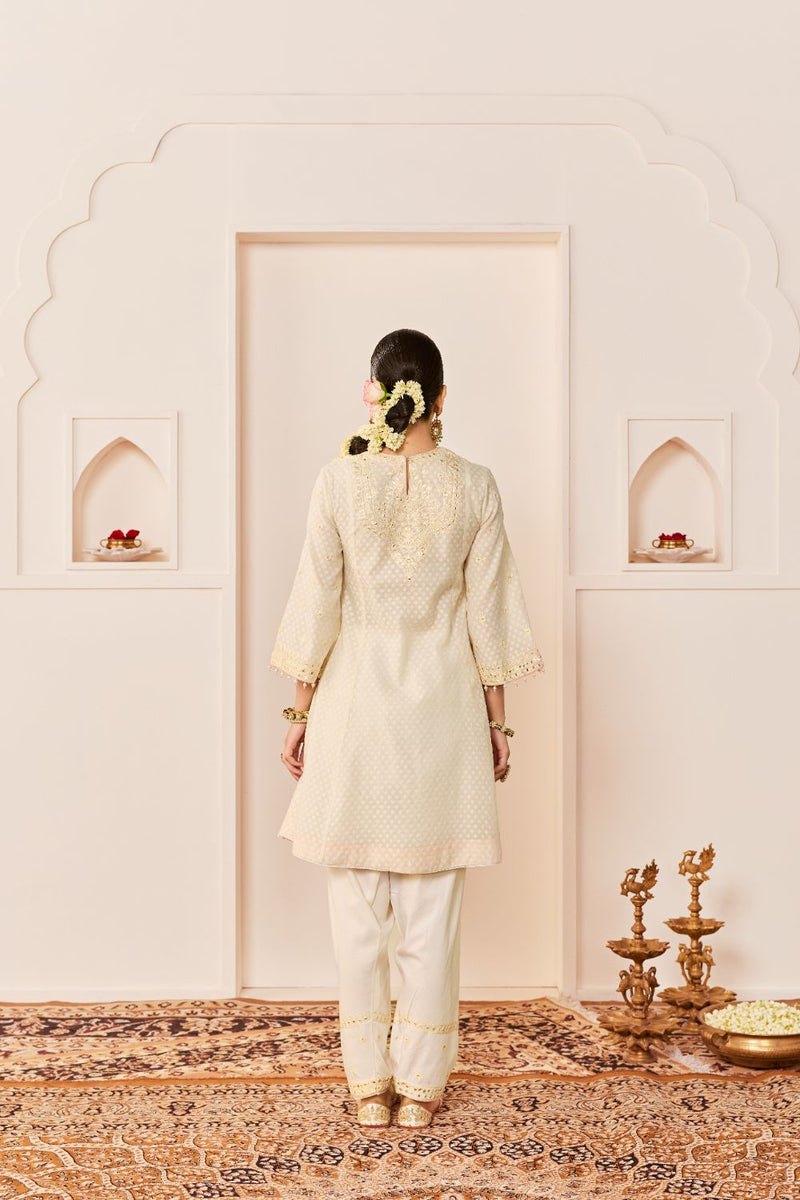 NIDA - DAISY IVORY SHORT CHOGA WITH FARSHI SALWAR chanderi silk kurta/kurta set by SHEETAL BATRA in daisy ivory with carnation pink for women Worldwide