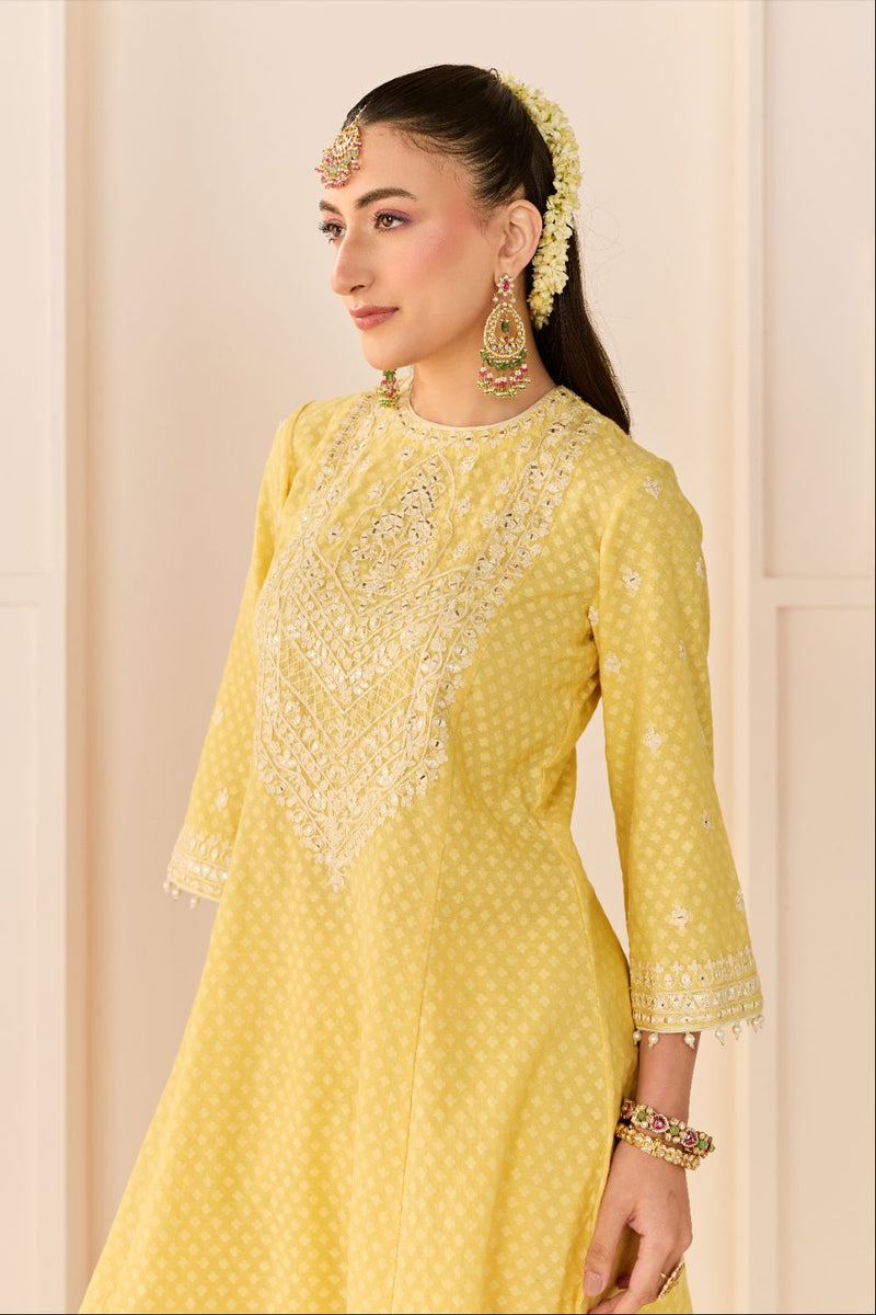 NIDA - LEMON YELLOW SHORT CHOGA WITH FARSHI SALWAR chanderi silk kurta/kurta set by SHEETAL BATRA in lemon yellow with mint green for women Worldwide