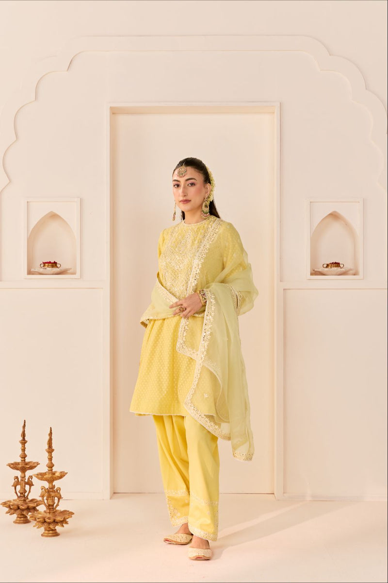 NIDA - LEMON YELLOW SHORT CHOGA WITH FARSHI SALWAR chanderi silk kurta/kurta set by SHEETAL BATRA in lemon yellow with mint green for women Worldwide