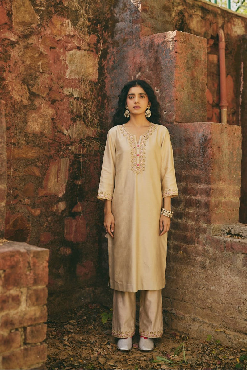 OSHANI & VRITIKA KURTA & PANT satin by Rashika Mittal in beige color for women Worldwide