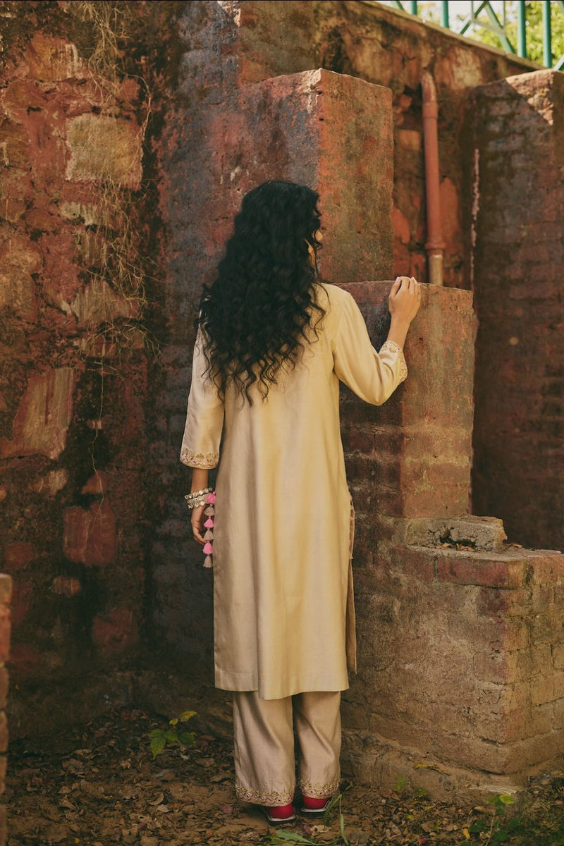 OSHANI & VRITIKA KURTA & PANT satin by Rashika Mittal in beige color for women Worldwide