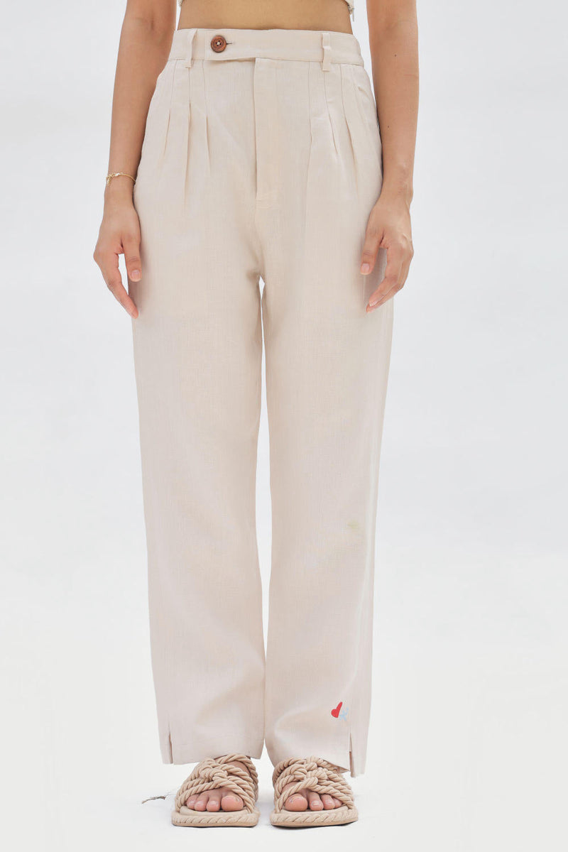 Ocean Breeze Linen Trousers by SUI in white color for women Worldwide