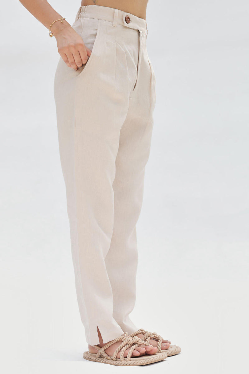 Ocean Breeze Linen Trousers by SUI in white color for women Worldwide