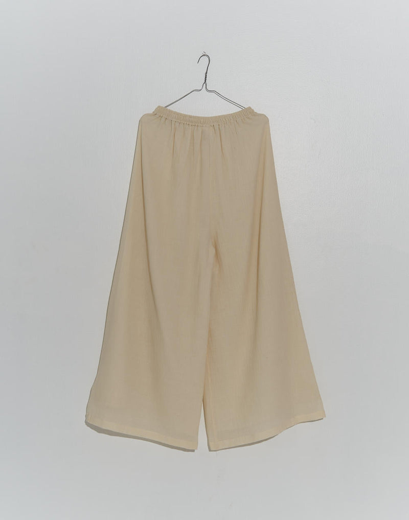 Off-White wide-legged Relaxed Pants 100% cotton by World of Crow in white color for women Worldwide