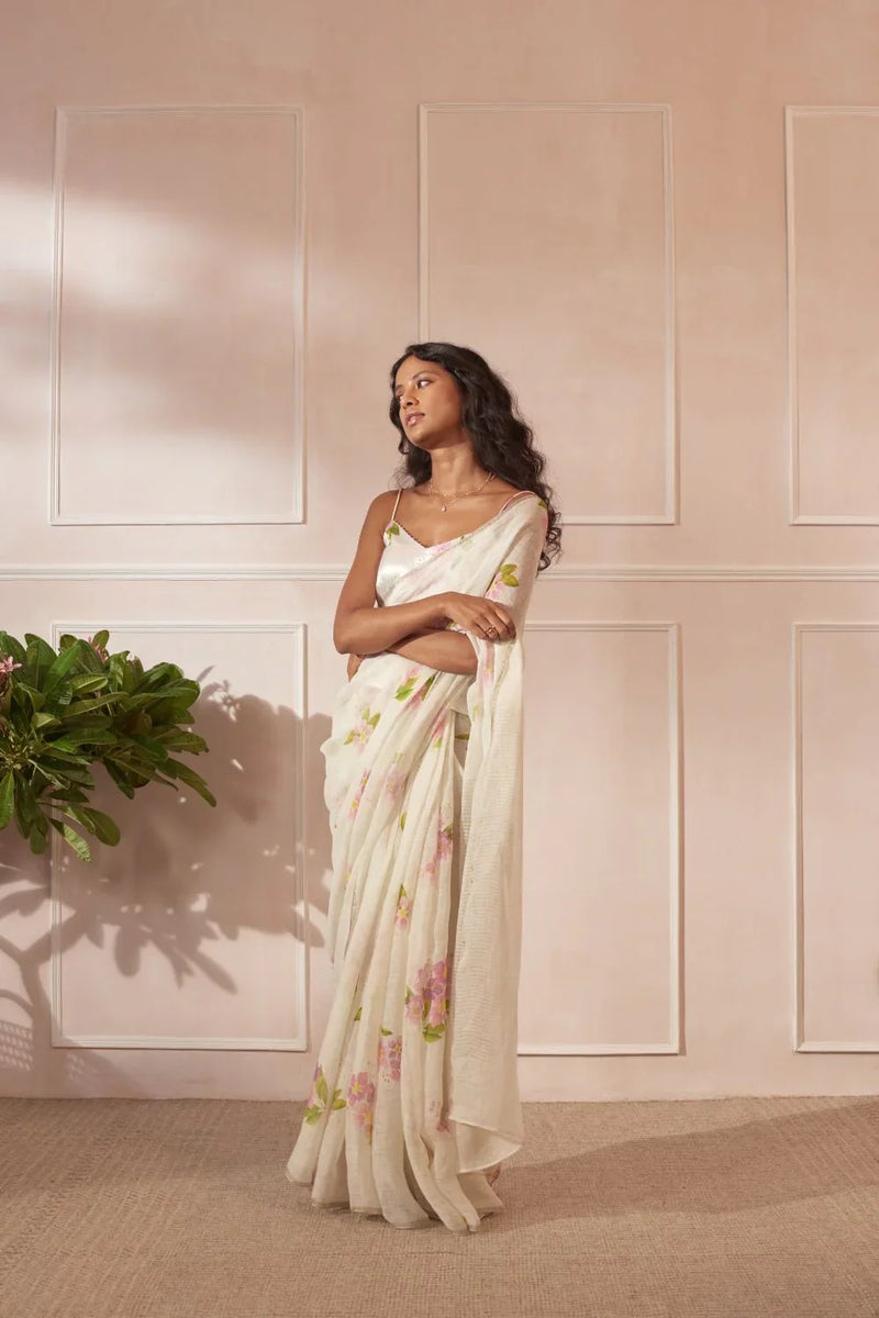 Off White Jarul Linen Sari by Nadiya Paar in white color for women Worldwide