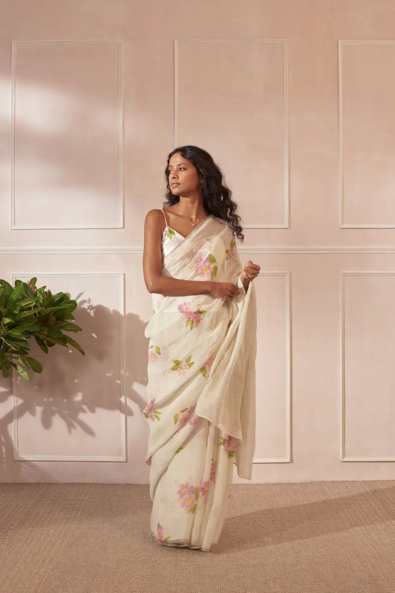 Off White Jarul Linen Sari by Nadiya Paar in white color for women Worldwide