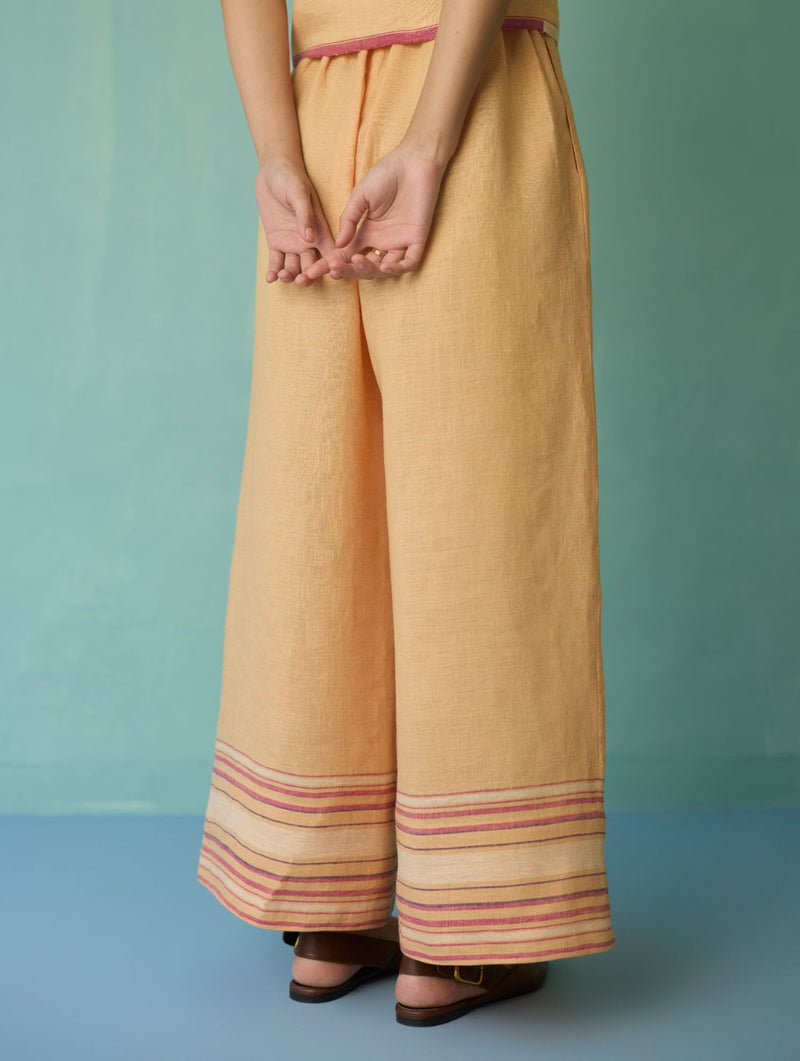 Alina Border Linen Pants - Apricot linen pant/trouser by Manan in apricot for women Worldwide