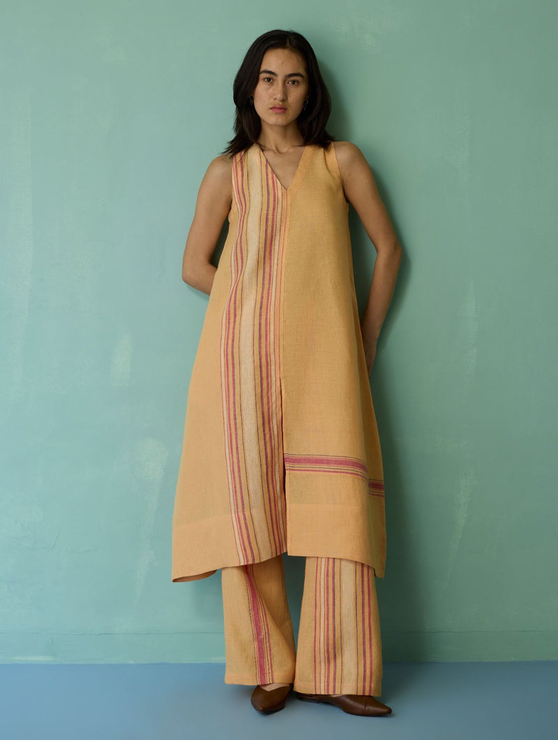 Vanya Border Linen Sleeveless Kurta Set - Apricot linen light kurta set by Manan in apricot for women Worldwide