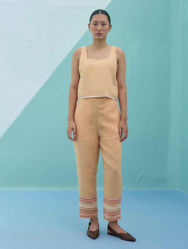 Ines Border Linen Tapered Pants - Apricot linen pant/trouser by Manan in apricot for women Worldwide